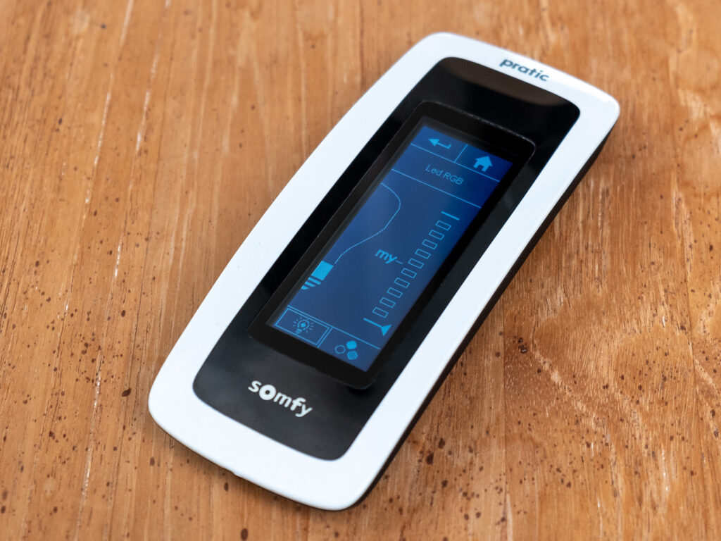 Detail of Somfy remote control to manage motorized pergolas